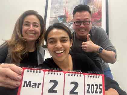 Thomas Lam with clients after a notary appointment